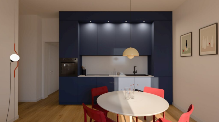 Cucina a parete blu navy con pensili integrati, luci incassate e piano lavoro bianco opaco.