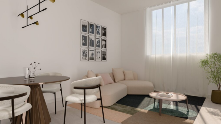 Soggiorno luminoso con tende bianche, divano angolare rosa cipria e parete decorata con fotografie in bianco e nero.