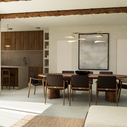 Sala da pranzo AD2 Habita con tavolo ovale in legno, sedute scure e cucina integrata in materiali materici.